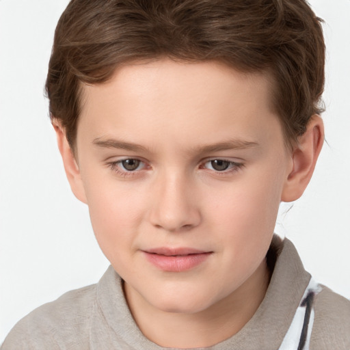 Joyful white child male with short  brown hair and brown eyes