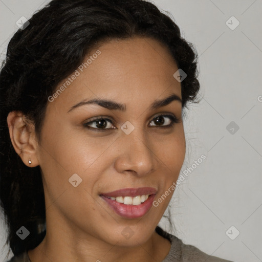 Joyful latino young-adult female with long  brown hair and brown eyes