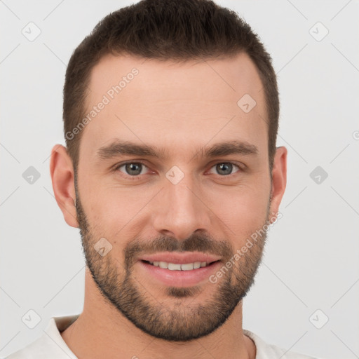 Joyful white young-adult male with short  brown hair and brown eyes