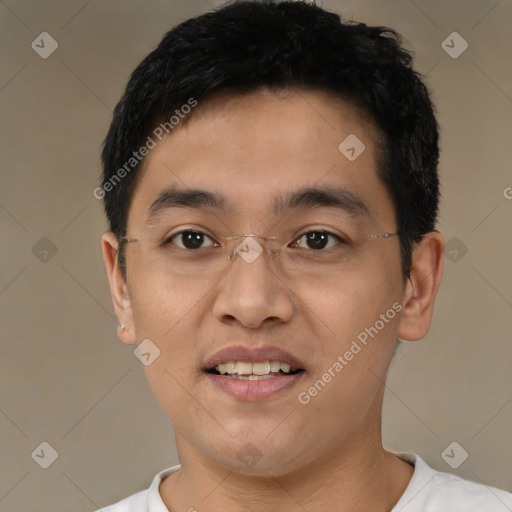 Joyful asian young-adult male with short  black hair and brown eyes