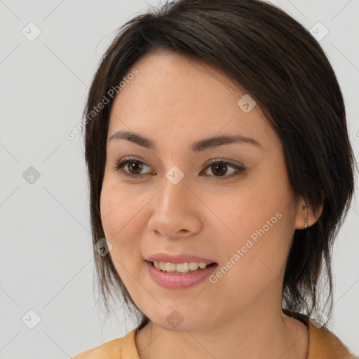 Joyful white young-adult female with medium  brown hair and brown eyes