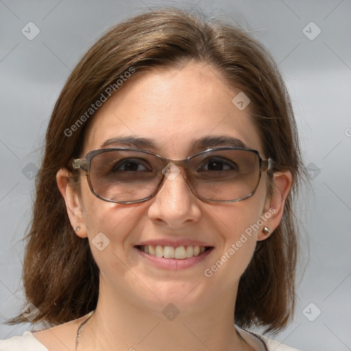 Joyful white adult female with medium  brown hair and brown eyes