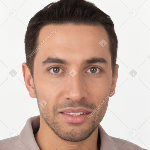 Joyful white young-adult male with short  brown hair and brown eyes