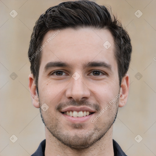 Joyful white young-adult male with short  black hair and brown eyes