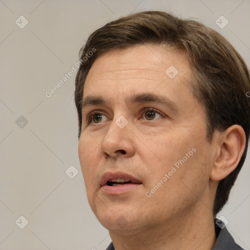 Neutral white adult male with short  brown hair and brown eyes