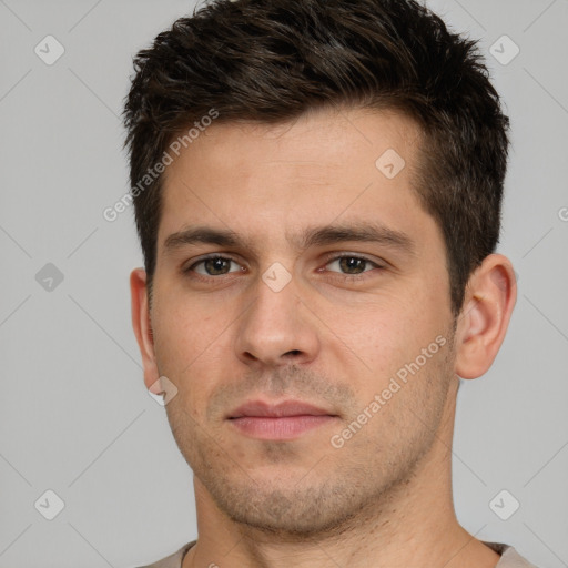 Neutral white young-adult male with short  brown hair and brown eyes