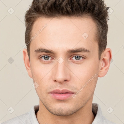 Neutral white young-adult male with short  brown hair and brown eyes