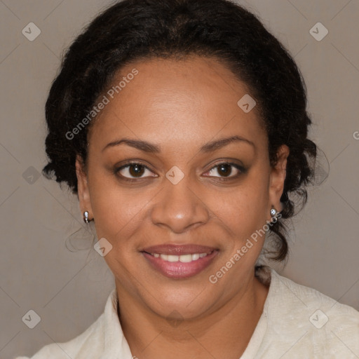 Joyful black adult female with medium  brown hair and brown eyes