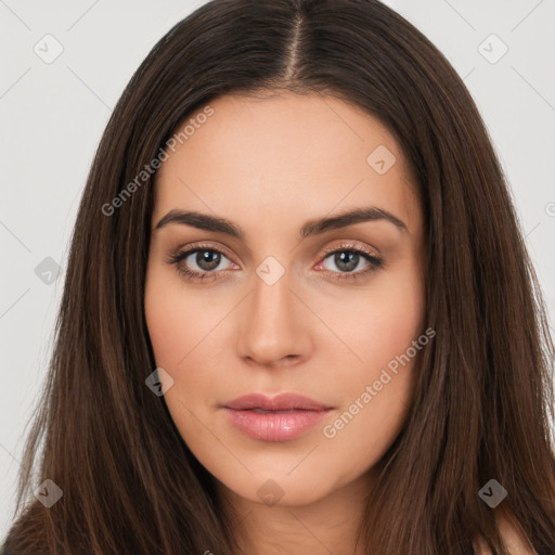 Neutral white young-adult female with long  brown hair and brown eyes