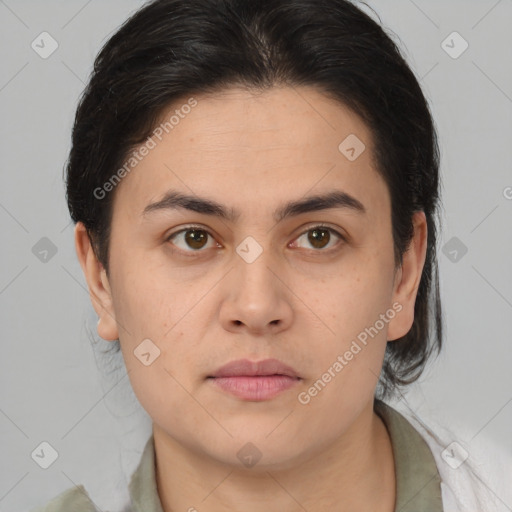 Joyful white young-adult female with medium  brown hair and brown eyes