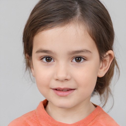 Joyful white child female with medium  brown hair and brown eyes