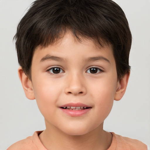 Joyful white child male with short  brown hair and brown eyes