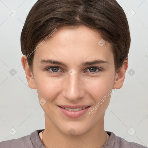 Joyful white young-adult female with short  brown hair and grey eyes