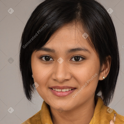 Joyful asian young-adult female with medium  brown hair and brown eyes