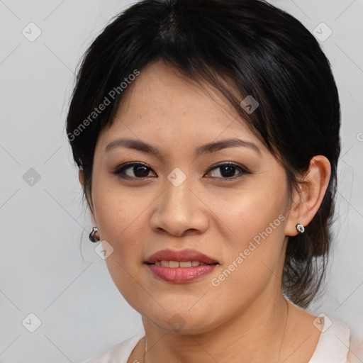 Joyful asian young-adult female with medium  brown hair and brown eyes