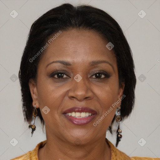 Joyful latino adult female with medium  brown hair and brown eyes