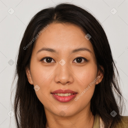 Joyful asian young-adult female with long  brown hair and brown eyes