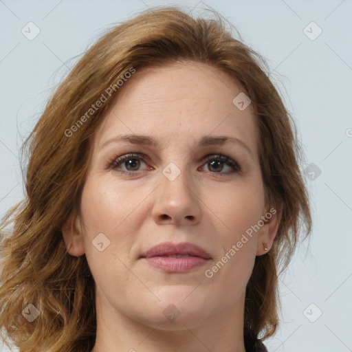 Joyful white adult female with long  brown hair and brown eyes