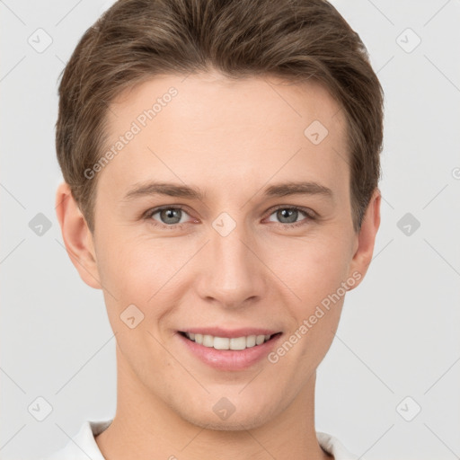 Joyful white young-adult female with short  brown hair and grey eyes