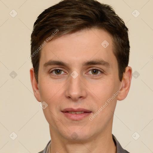 Joyful white young-adult male with short  brown hair and brown eyes