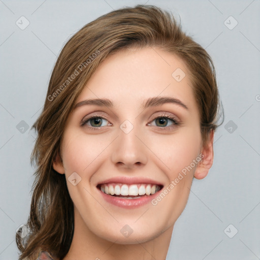 Joyful white young-adult female with medium  brown hair and green eyes