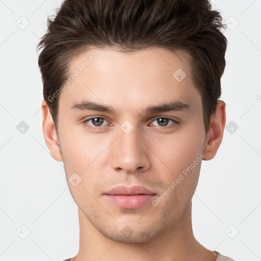 Neutral white young-adult male with short  brown hair and brown eyes