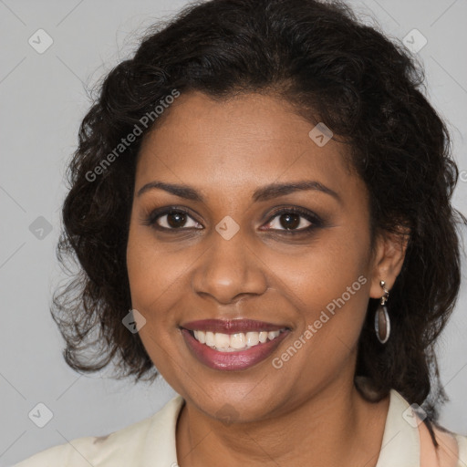 Joyful black young-adult female with long  brown hair and brown eyes