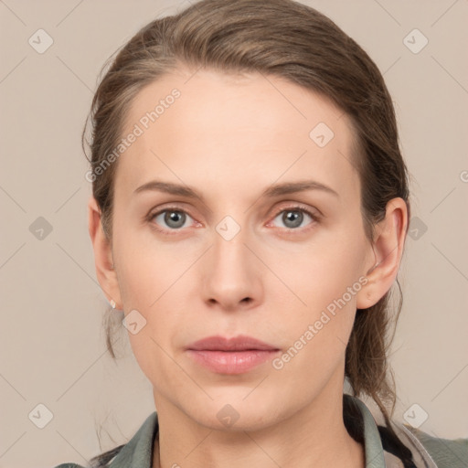 Neutral white young-adult female with medium  brown hair and grey eyes