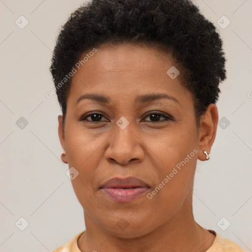 Joyful black adult female with short  brown hair and brown eyes