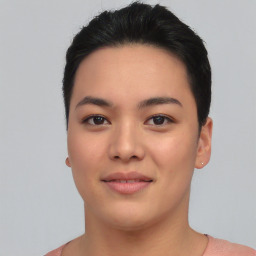 Joyful asian young-adult female with short  black hair and brown eyes