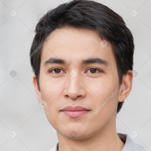 Joyful white young-adult male with short  black hair and brown eyes