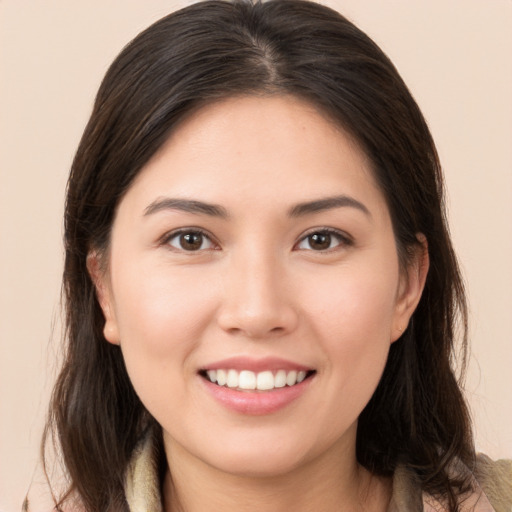 Joyful white young-adult female with medium  brown hair and brown eyes