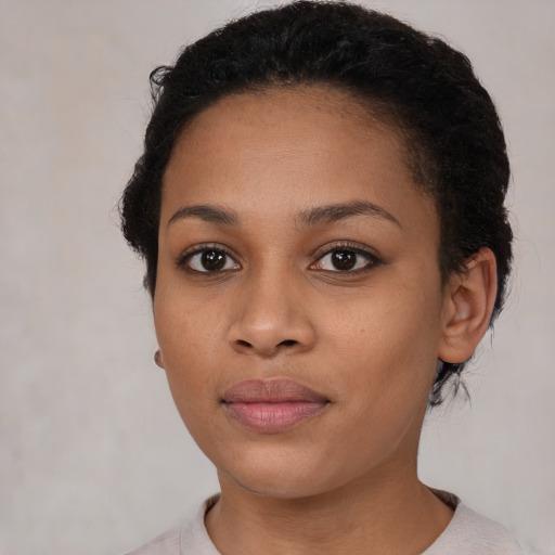 Neutral black young-adult female with short  black hair and brown eyes