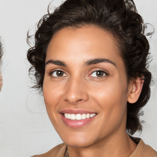 Joyful white young-adult female with medium  brown hair and brown eyes