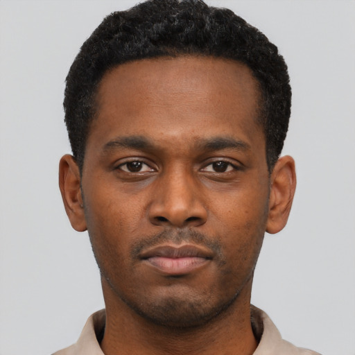 Neutral black young-adult male with short  black hair and brown eyes