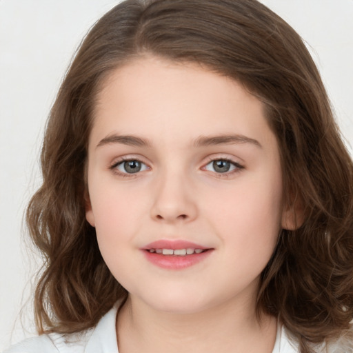 Joyful white child female with medium  brown hair and brown eyes