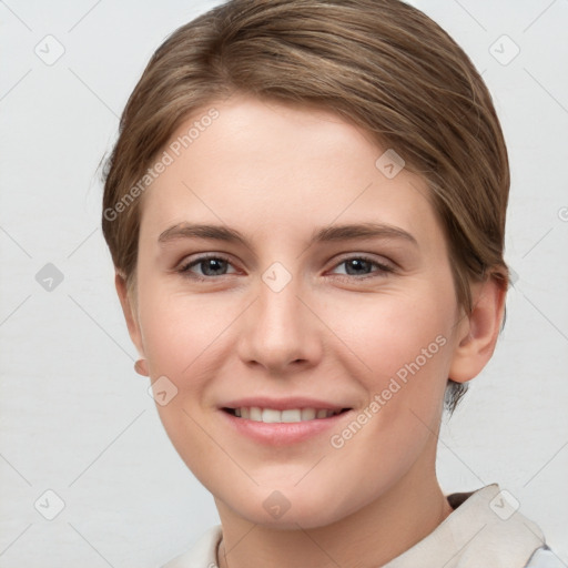 Joyful white young-adult female with short  brown hair and grey eyes