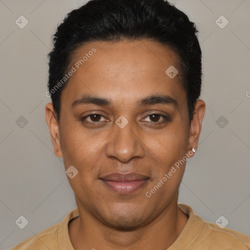 Joyful latino young-adult male with short  black hair and brown eyes