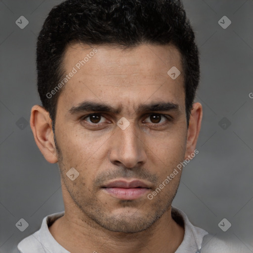 Neutral white young-adult male with short  brown hair and brown eyes