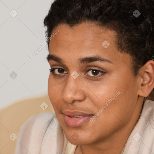 Joyful latino young-adult female with short  brown hair and brown eyes