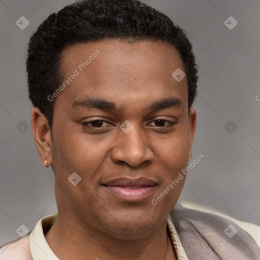 Joyful latino young-adult male with short  brown hair and brown eyes