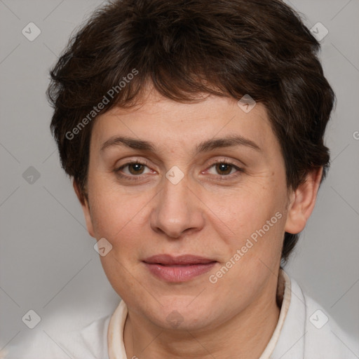 Joyful white adult female with short  brown hair and brown eyes