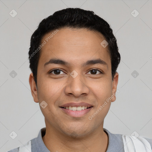 Joyful latino young-adult male with short  black hair and brown eyes