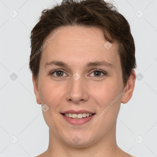 Joyful white adult female with short  brown hair and grey eyes