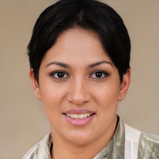 Joyful asian young-adult female with short  brown hair and brown eyes