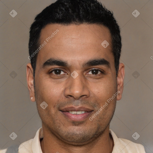 Joyful latino young-adult male with short  black hair and brown eyes