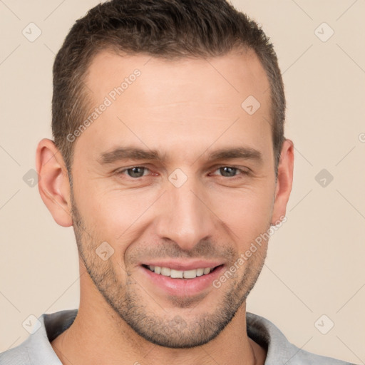 Joyful white young-adult male with short  brown hair and brown eyes