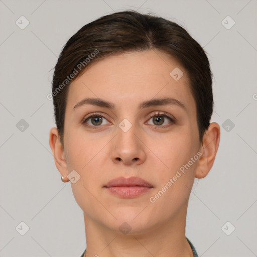 Neutral white young-adult female with short  brown hair and brown eyes