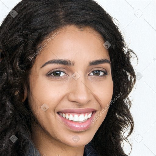 Joyful latino young-adult female with long  brown hair and brown eyes