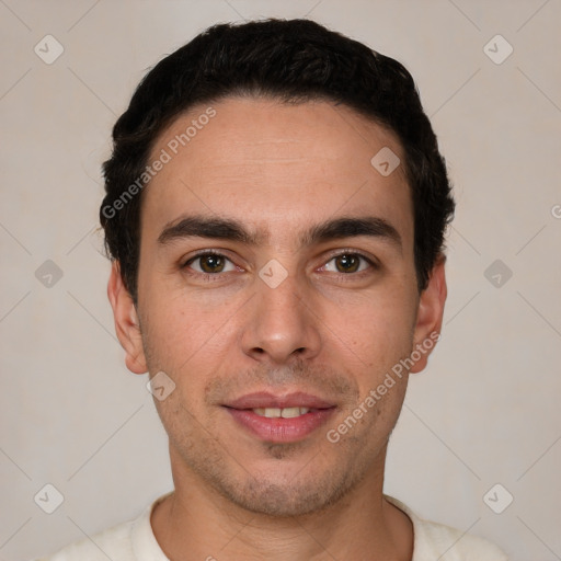 Joyful white young-adult male with short  black hair and brown eyes